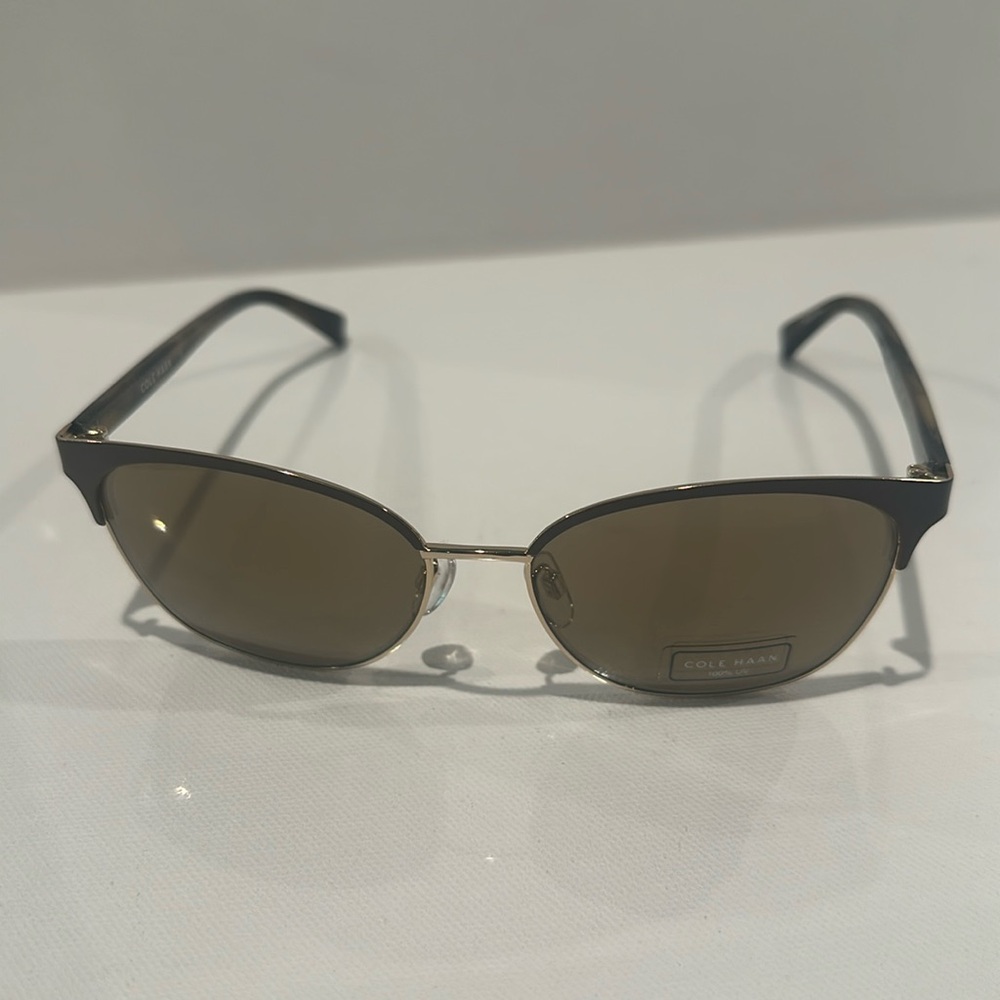 NWT Cole HAAN Unisex Designet Sunglasses with goldtone and brown rim 100% UV.